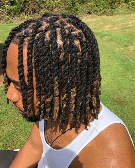 This combination service includes a retwist as well as styling. Styling for locs includes anything from 2/3/4 Strand Twists, Barrell Twists, Braids, Up-Do's etc. • Please note that locs longer than shoulder length will be an additional $5 added to styling costs. $75.00. 1h 30min. Book. Loc Retwist. Loc Style.